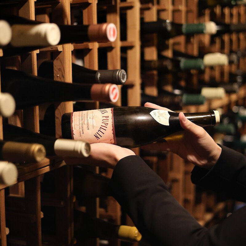 A bottle in a wine cellar
